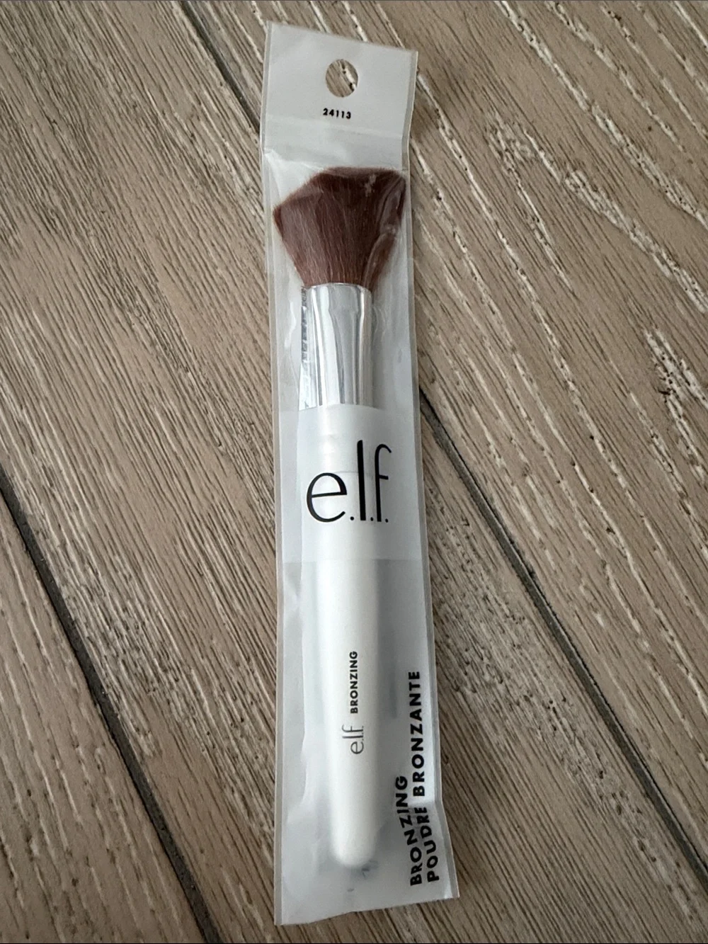 Elf make up brush and NARS Light Reflecting Setting Powder NEW